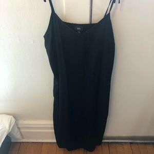Slinky black dress, side slit with sporty stripe